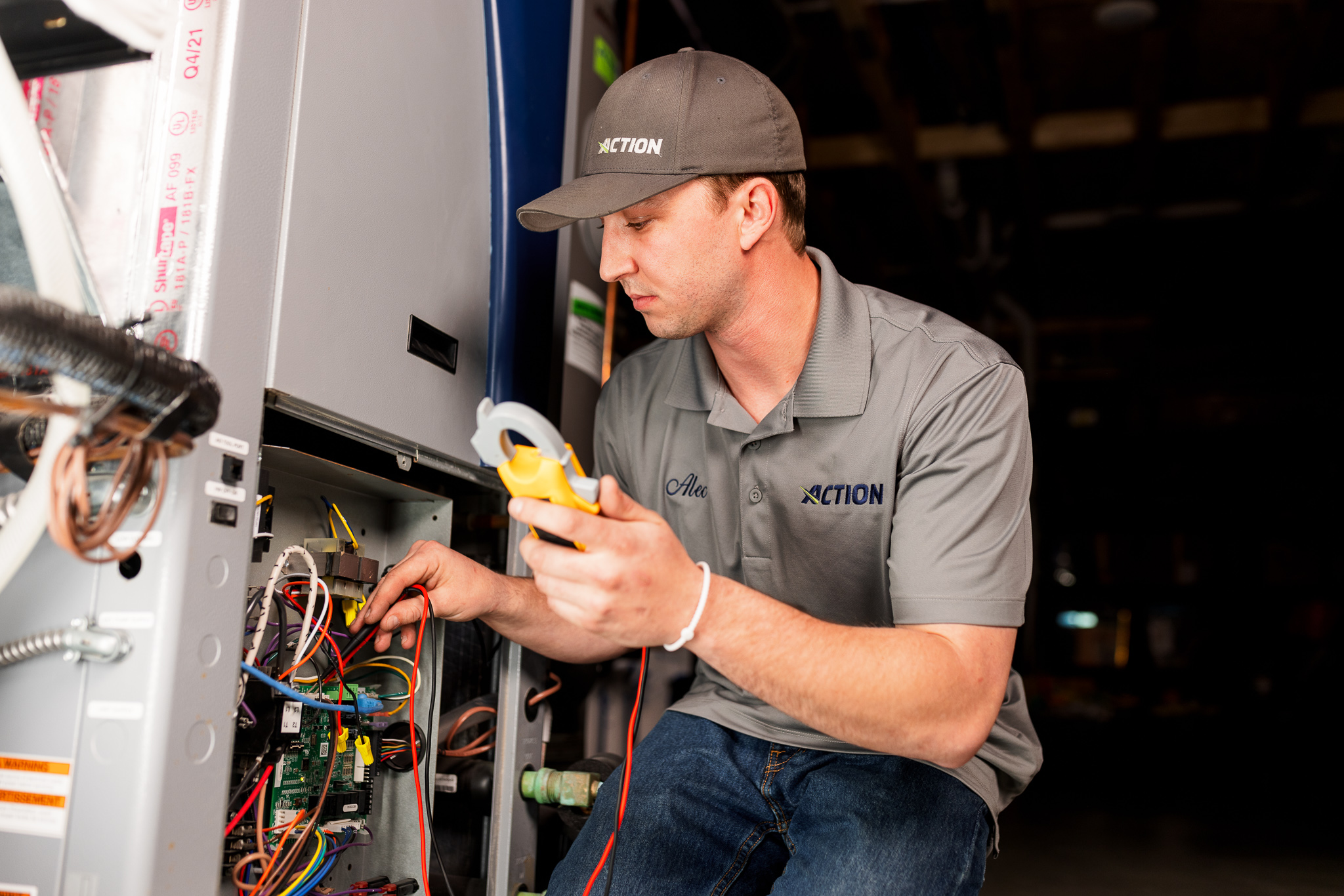 Action technician checking heating