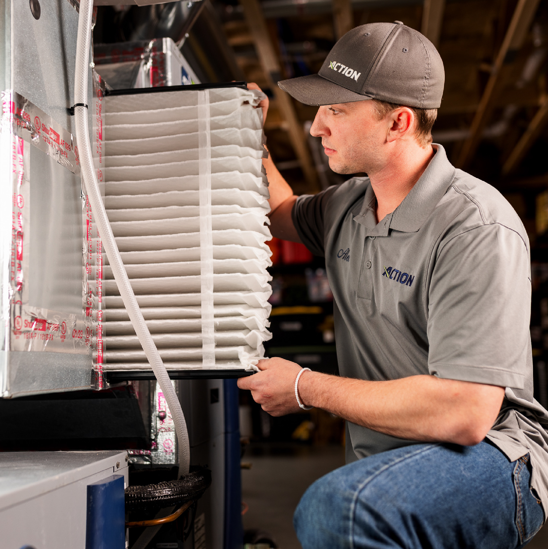 Technician checking filter