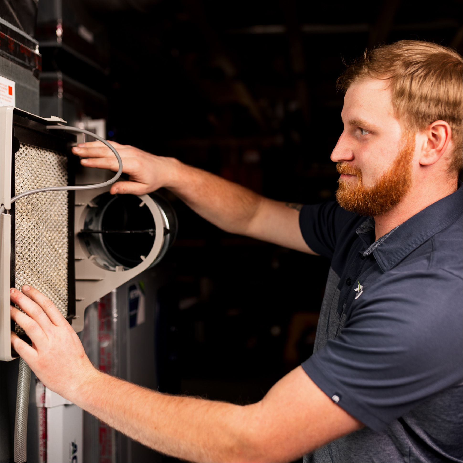 Technician checking filter