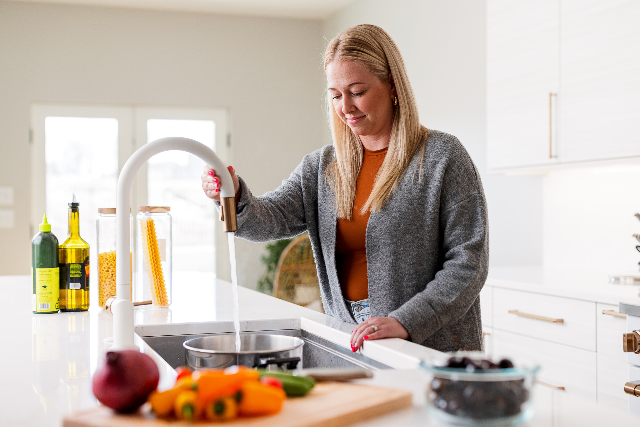 Woman Using Sink