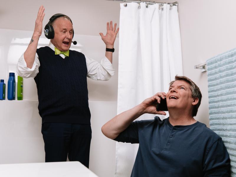 image of kent pavelka and man on the phone