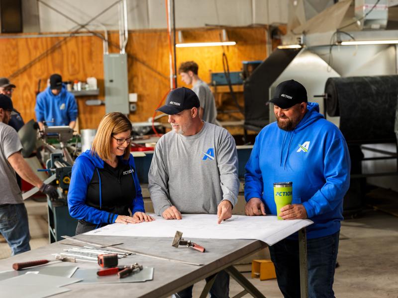 Action Employees Working looking at plans